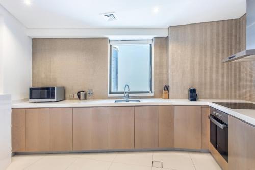 Damac Towers By Paramount Apartments - The S Holiday Homes - image 14