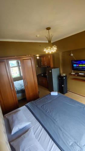 Kamar Apartemen Harian by Younz Apartmen Depok in Depok