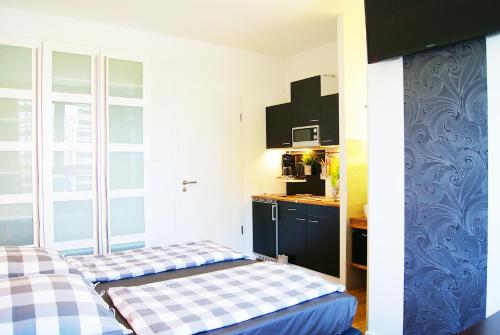 Apartments Rummelsburger Bucht am Ostkreuz 489m von Max Taut Aula entfernt