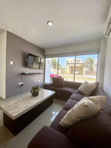 Jagatud salong / TV-ala, Victoria’s Beach house in Alvarado