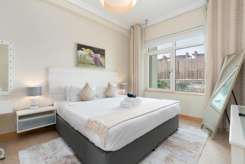 Welcoming 1 Bedroom Palm Jumeirah with sea View, Dubai (Foto 2)