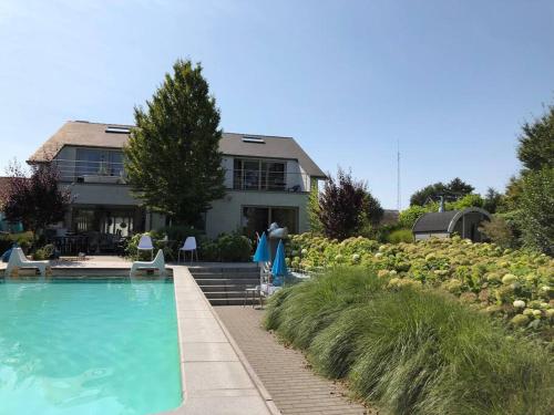 Vakantievilla met zwembad, wellness en glamping in Paal/Beringen gîte à louer Ravenshout