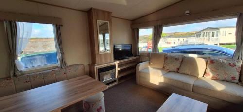Shared lounge/TV area, NB166 - Porth Bay Hideaway in Trevelgue