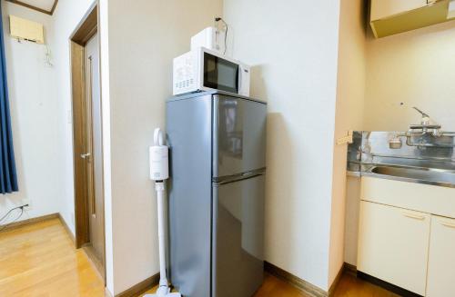 廚房, Furano Zone Ski Condo Room 202 Smoking Allowed and Room 103 Non Smoking in 學田車站