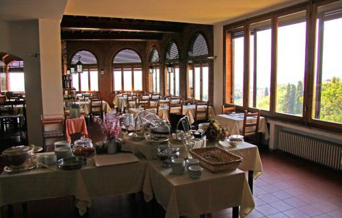 Ресторан, Hotel La Cisterna in Сан - Гіміньяно