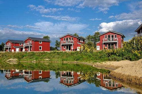 B&B Hechthausen - Holiday homes by the lake in the Geesthof holiday park Hechthausen - Bed and Breakfast Hechthausen