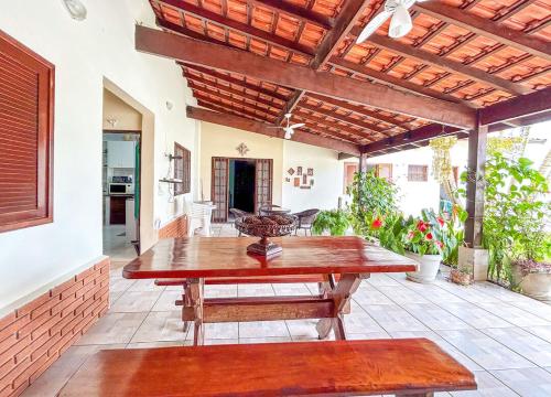 阳台/露台, Casa com churrasqueira e piscina em Itanhaem in 博皮兰加