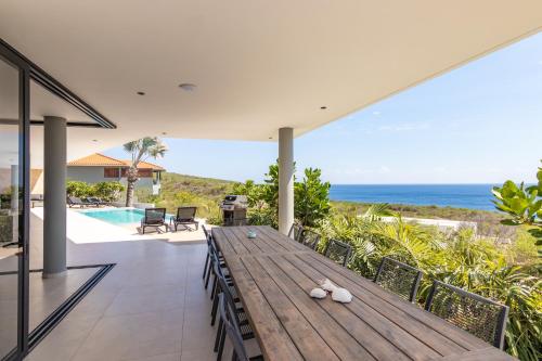 Luxury 12-Person Villa in Cas Abou with Pool, Seaview, and Private Beach Access