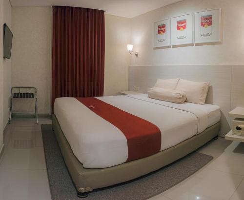 The WIN hotel Room Type - UNIC Queen Room