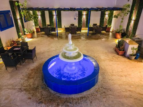 Kert, البرج الأزرق للشقق الفندقية - Blue Tower Hotel Apartments (البرج الأزرق للشقق الفندقية - Blue Tower Hotel Apartments) in Al Aziziyah