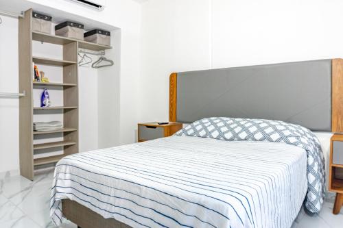 Apartamento con Alberca SmartTV y Jardin