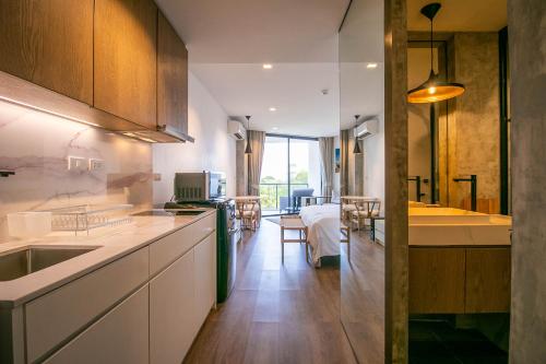 Escape Condominiums Beachfront Suites - Mae Phim - 주방