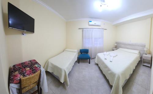 1 double bed, 3 twin beds