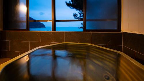 Resort Hotel Mihagi Room Type - Deluxe Twin Room with Tatami Area and Semi Open-Air Bath, Ocean View