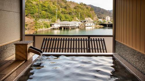 Open air bath, 夕景の宿　海のゆりかご　萩小町 in Hagi