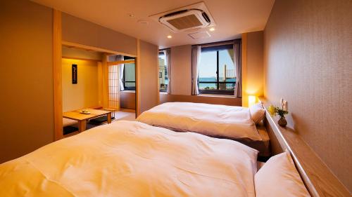 宵待ちの宿 萩一輪 Room Type - Twin Room with Tatami Area and Private Sauna 宵待ちの宿 萩一輪 Room Type - Twin Room with Tatami Area and Private Sauna