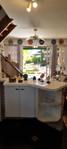 مطبخ, Casa Ilhabela Frente ao Mar Condominio Alto Padrão (Casa Ilhabela Frente ao Mar Condominio Alto Padrao) in Praia Grande