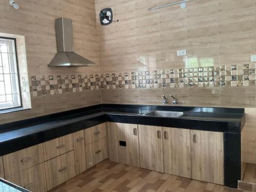 مطبخ, Shantham Service Apartments Indumanagar in فيناياغابورام