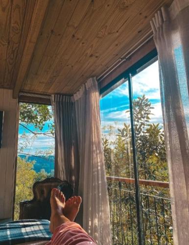 Balcony/terrace, Cabana Mirim Estalagem Rural in Grama
