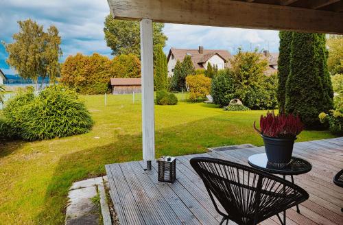 Wunderschönes Haus am See - Seeblick, großer Garten, Südbalkon, Carport & Smart-TV