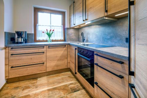 廚房, Gastehaus Brantlhof Zimmer und Ferienwohnungen in Going am Wilden Kaiser in 凱撒山麓戈英