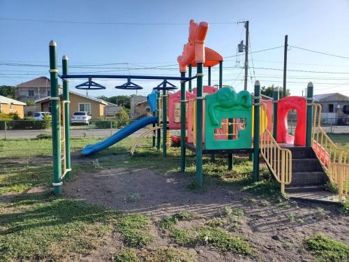 Playground, 1-Bed House Sleeps 2 in Secure Community in Old Harbour