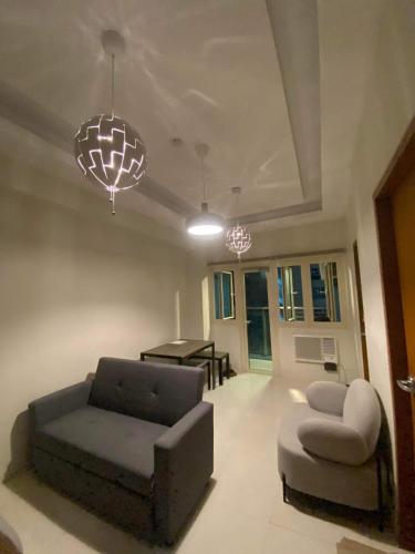 Homey 1Bedroom BGC Condo - MINIMUM 2 Nights stay, Manila