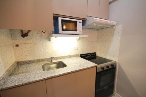 Huellas Boutique Apartments - 주방