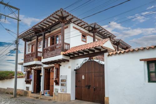 Quadruple Room with Balcony room in HOTEL ALTIPLANO VILLA DE LEYVA