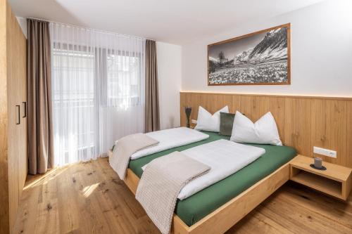 B&B Lutago - Zum Sonnentor App Larix - Bed and Breakfast Lutago