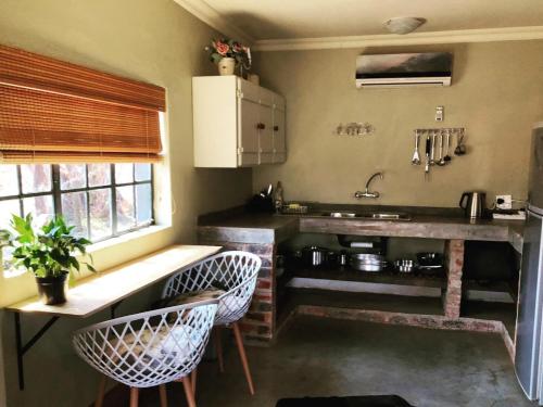 Konyha, Schoemanshof in North-West University