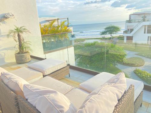 Hacienda Iguana Colorado beach front house with swimming pools and ocean view in Iguana