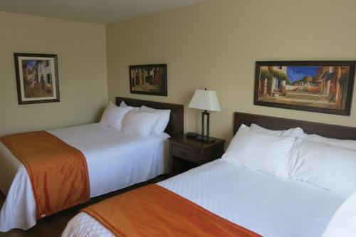 Days Inn by Wyndham Levis Room Type - Queen Room with Two Queen Beds - Non-Smoking
