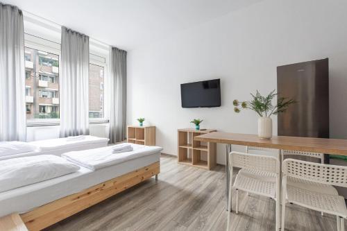 T&K Apartments - 2 Room Apartment - Ground Floor, Düsseldorf (photo 2)