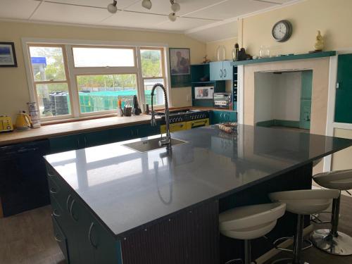 Kitchen, Large riverfront home with spa and stage in Te Kopuru