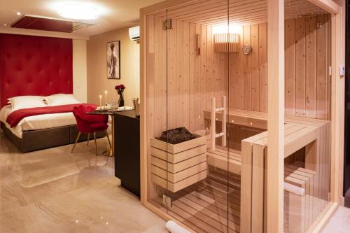 ELÉGANCE & SPA - chambre d'hôtes avec sauna et jacuzzi privatif Hotel de charme Servian