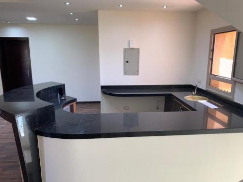 فيلا بحمام سباحه 6 غرفه نوم داخل كومباوند اكتوبر هيلز امام مول العرب - image 11