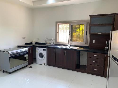 فيلا بحمام سباحه 6 غرفه نوم داخل كومباوند اكتوبر هيلز امام مول العرب - image 14