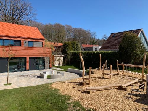 De ole School Ferienapartments Hohwacht Large-Apartment 25 , Huus Blomen in 霍瓦赫特