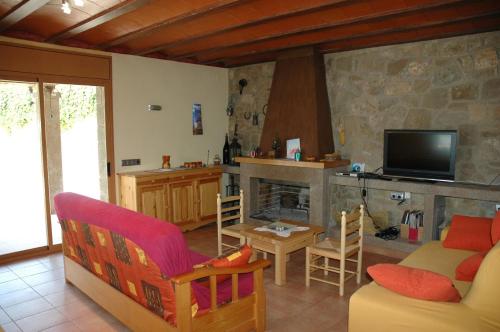 Közös társalgó / TV, Casa con vistas al lago y con piscina - Caso Nou in La Baronia de Rialb