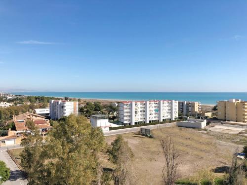 Global Properties, Moderno apartamento con piscina en la playa de Canet