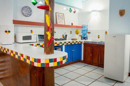 Kitchen, Eco Suites Uxlabil Guatemala in Guatemala City