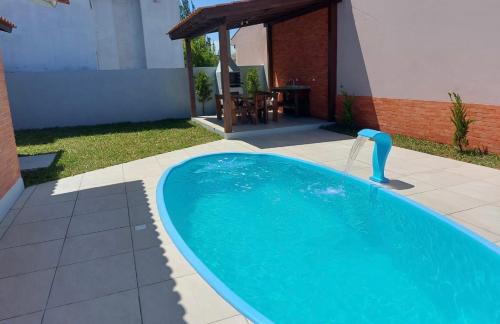 Casa com piscina em bella torres