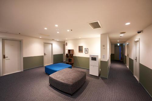 Compact Single Room with Shared Bathroom and Toilet image 10