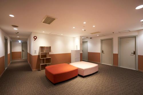 Compact Single Room with Shared Bathroom and Toilet image 9