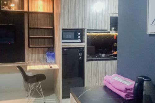 RedLiving Apartemen Royal Sentul Park - Budi Property