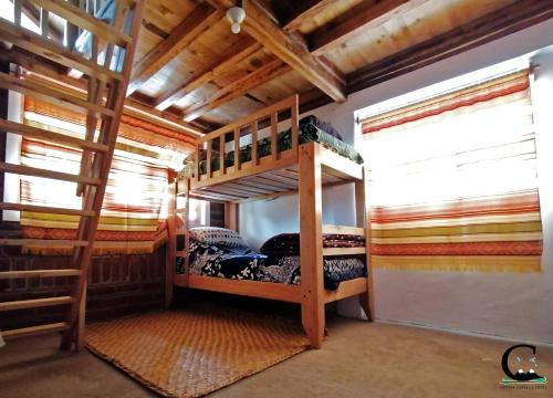 1 queen bed, 1 twin bed, 2 bunk beds