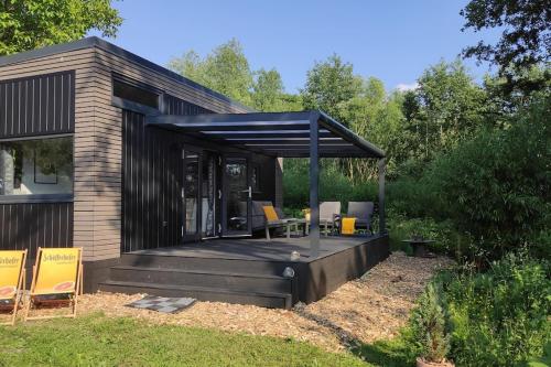 Gemütliches Tiny House mit Terrasse & Klima an Badesee & Naturpanorama für max 4 Gäste in Salzhemmendorf, Deutschland