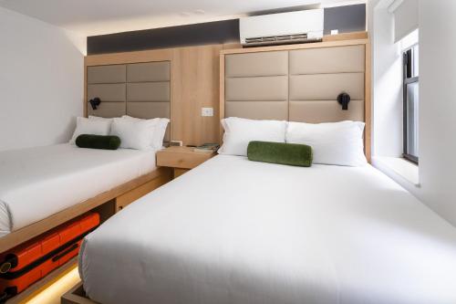Standard Queen Room with Two Queen Beds room in Little Charlie Hotel