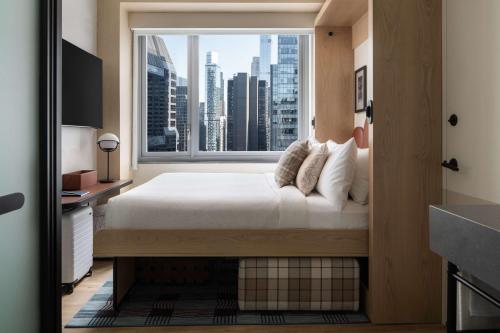 Flex Room with Wall Bed and City View image 10